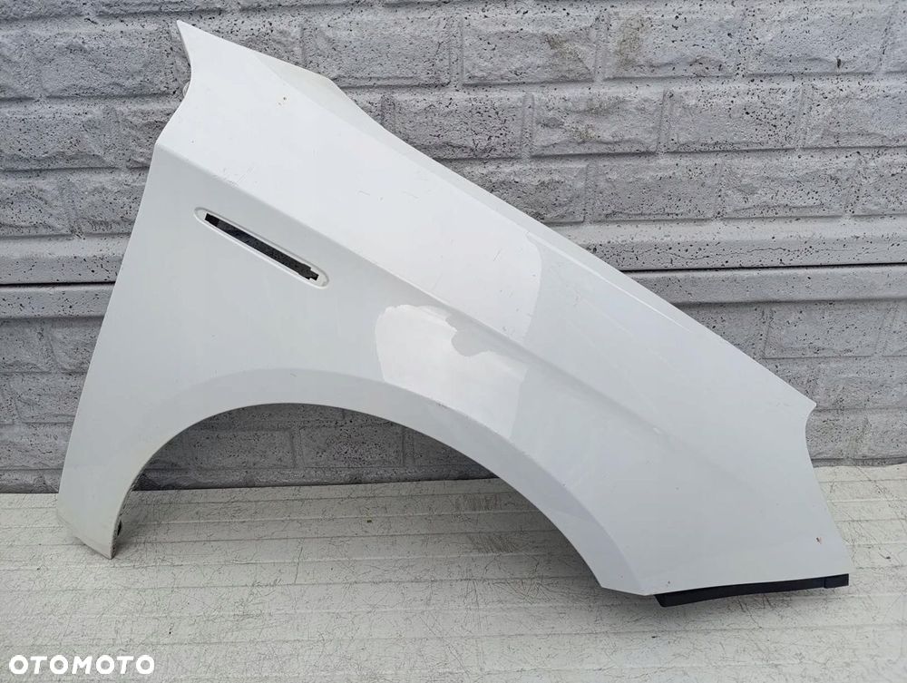 ALFA ROMEO GIULIETTA BŁOTNIK PRZEDNI PRAWY ORYGINAŁ - 1