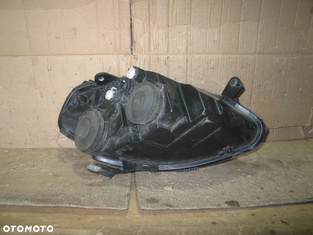 lampa przod lancia ypsilon 2 II lift 06-11r. oryginal europa - 11