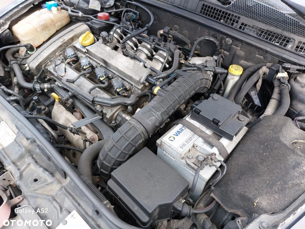 Zderzak ALFA ROMEO GT 06R. maska,lampy,drzwi,klapa..... - 10