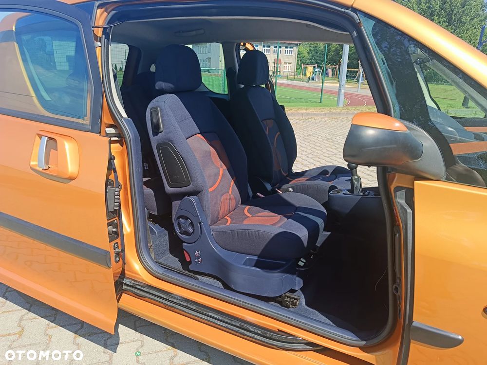 Peugeot 1007 1.4 Trendy - 11