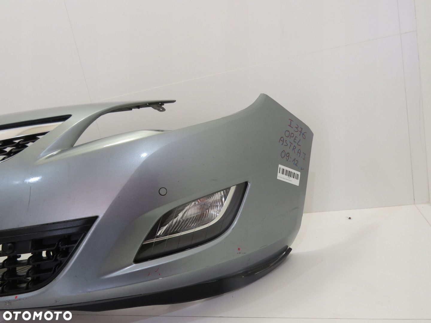 ZDERZAK PRZÓD PRZEDNI OPEL ASTRA J 09-12R - 12