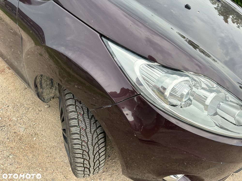 Ford Fiesta 1.4 Ghia - 11
