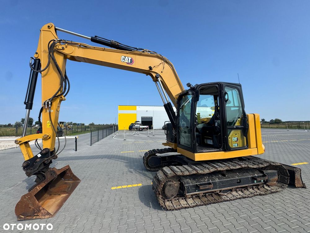 Caterpillar 310 - 5