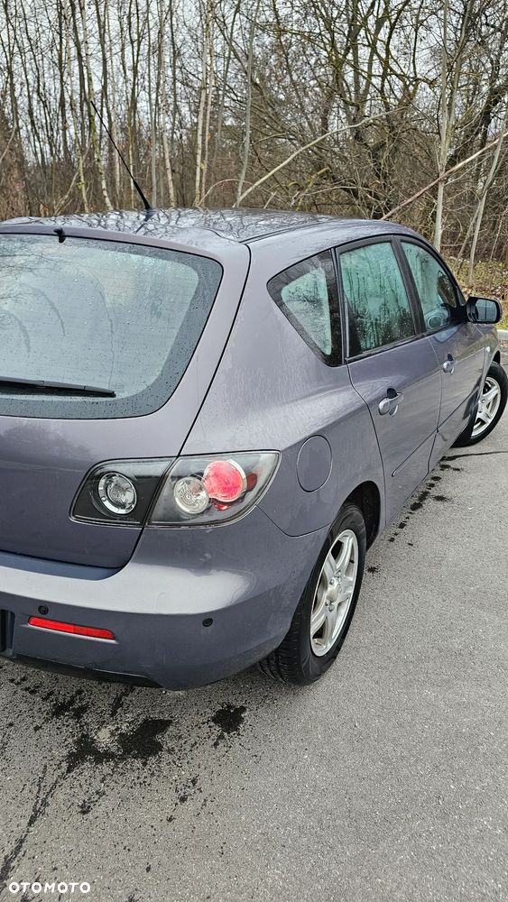 Mazda 3 1.6 Exclusive + - 6