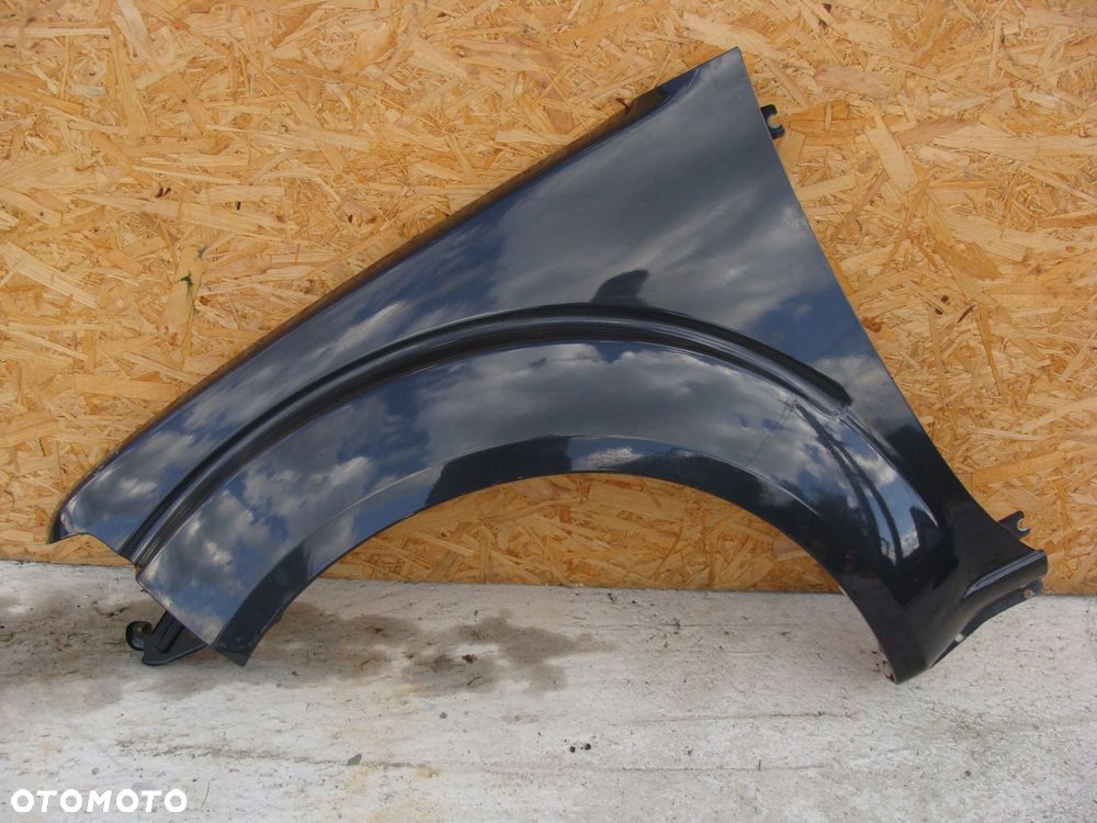 błotnik lewy nissan navara d40 bez rdzy !!! - 1