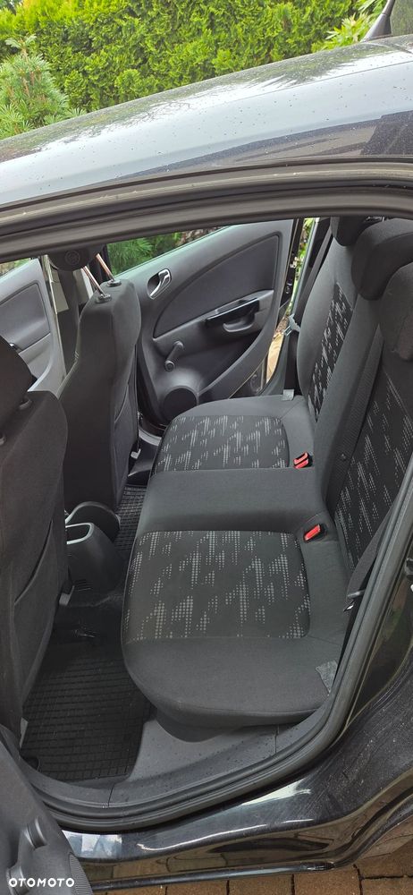 Opel Corsa 1.4 16V Enjoy - 11