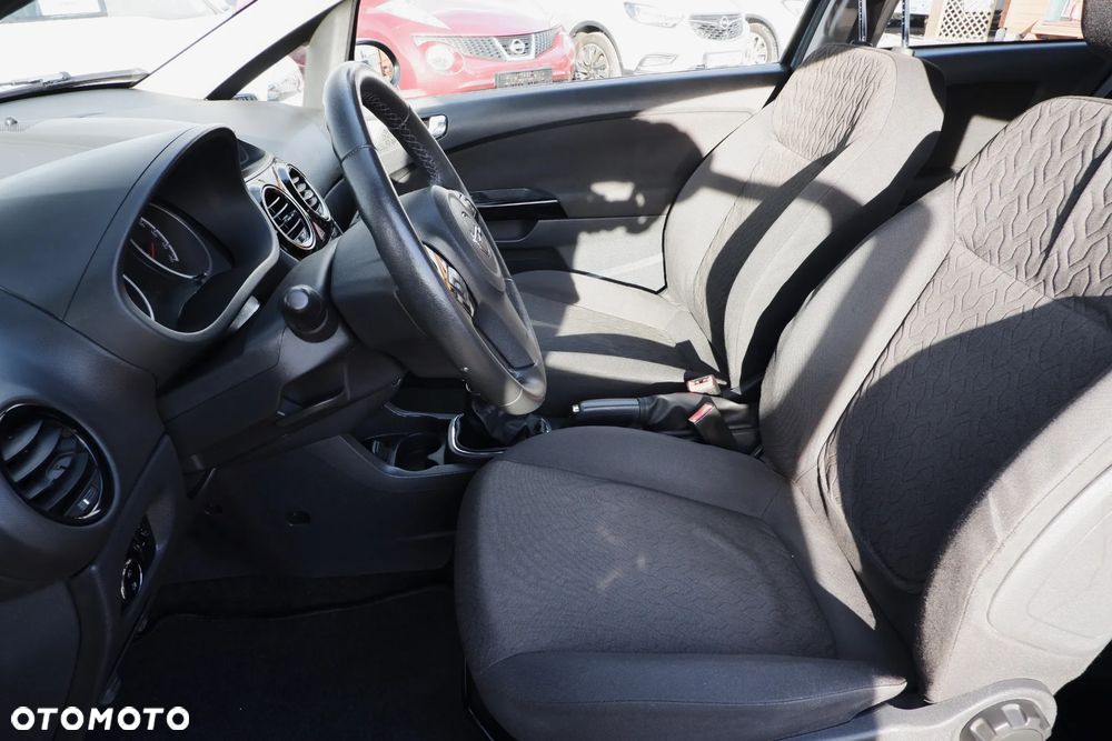 Opel Corsa 1.2 16V Enjoy - 23