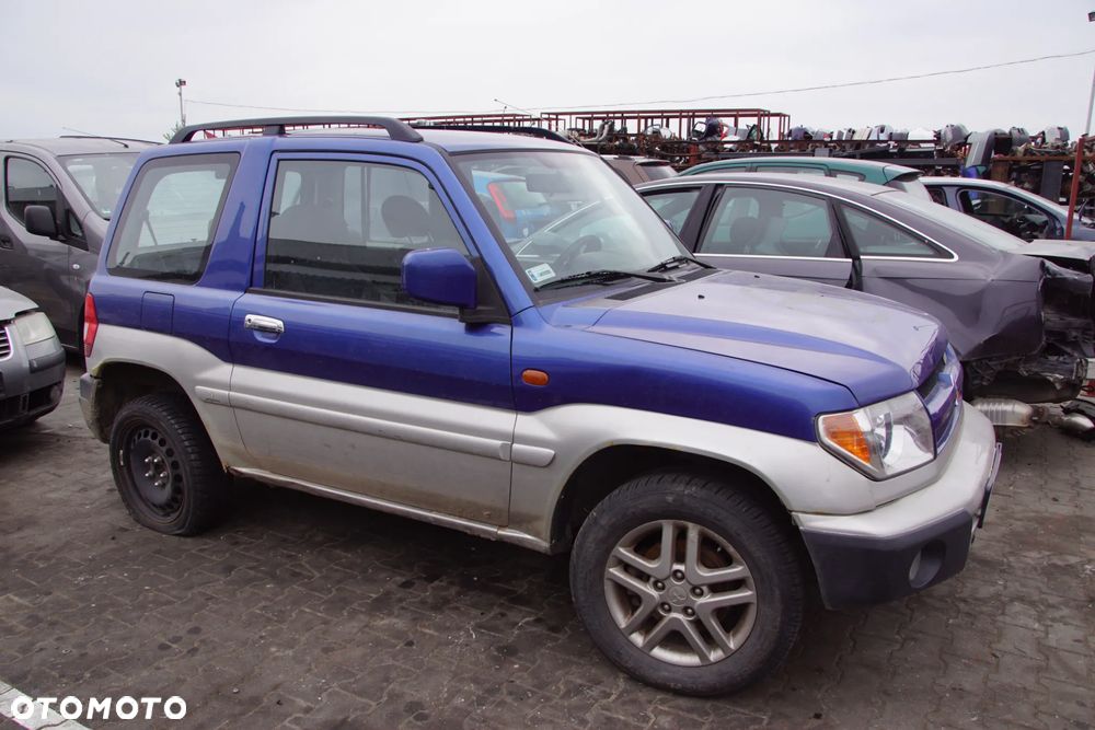 Auto na części - Mitsubishi Pajero Pinin 2.0 GDI 129 KM 4G94 V5M21 TH9B 2003R Silnik Skrzynia Drzwi Maska Błotnik Klapa Zderzak Lampa Lusterko Klamka Szyba Deska Kokpit Sterownik Moduł Czujnik Licznik Wyświetlacz Panel Kierownica - 7