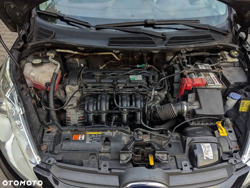 Ford Fiesta 1.4 Ghia EU5 - 21