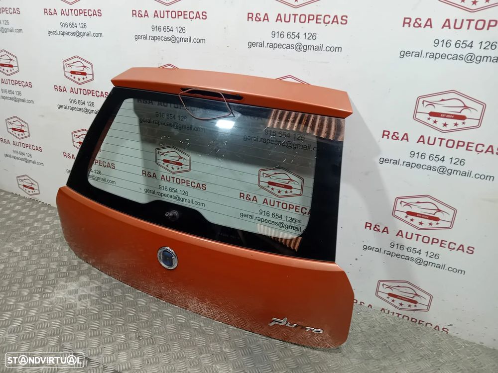 Tampa de Mala Fiat Grand Punto 199 Original - 3
