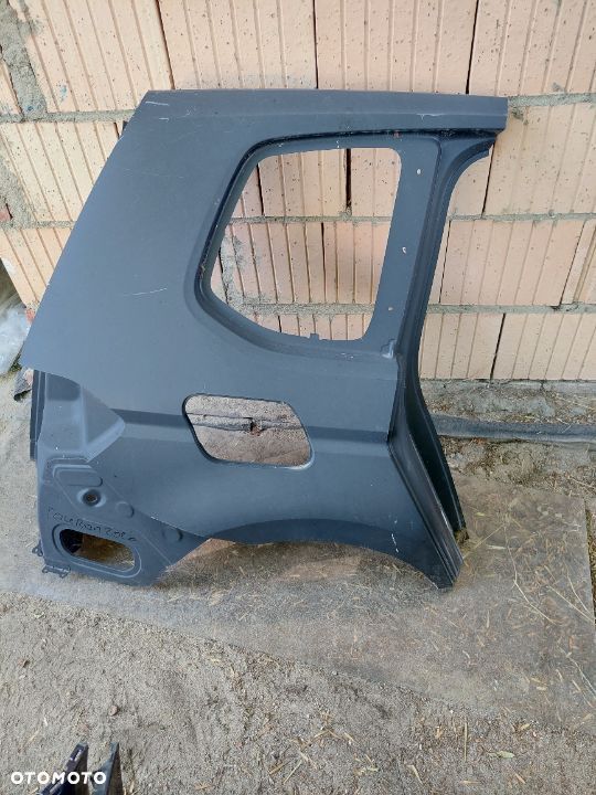Blotnik prawy tyl VW Touran 15-19 - 1