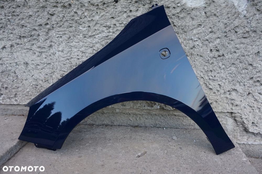 BŁOTNIK LEWY SKODA FABIA II 2 ROOMSTER 4711 - 4