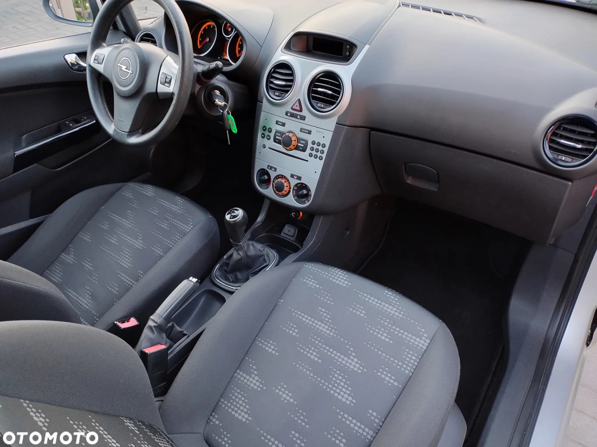 Opel Corsa 1.2 16V Enjoy - 30