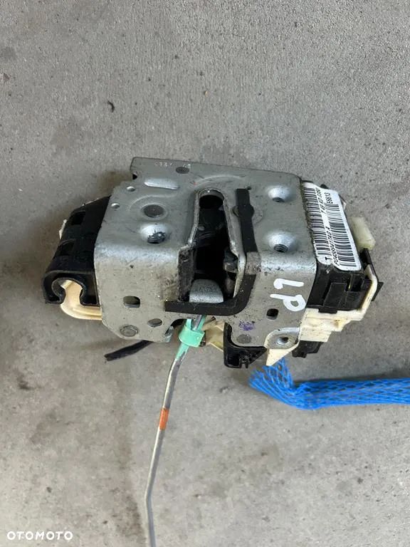 zamek drzwi lewy przód Dodge Caliber P04589417AG