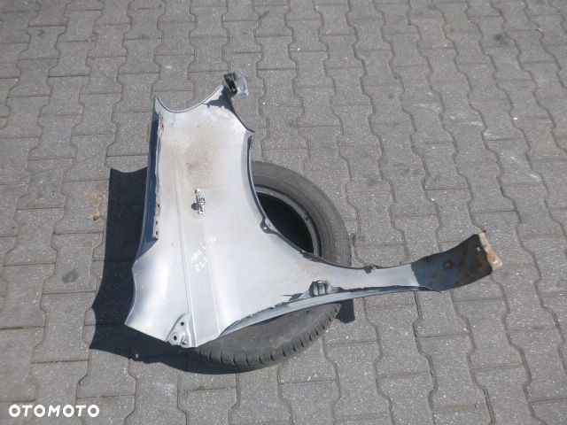 BŁOTNIK LEWY PRZÓD LEWY PRZEDNI TOYOTA YARIS I LIFT KOLOR 855 - 11