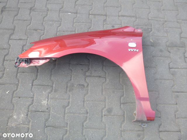 BŁOTNIK LEWY PRZÓD LEWY PRZEDNI TOYOTA COROLLA E12 01-04 KOMBI KOLOR 3N8 - 1