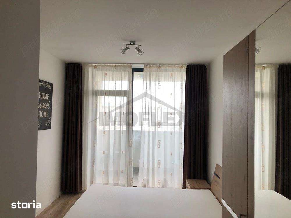 Apartament cu 2 camere de inchiriat — fotografia 1