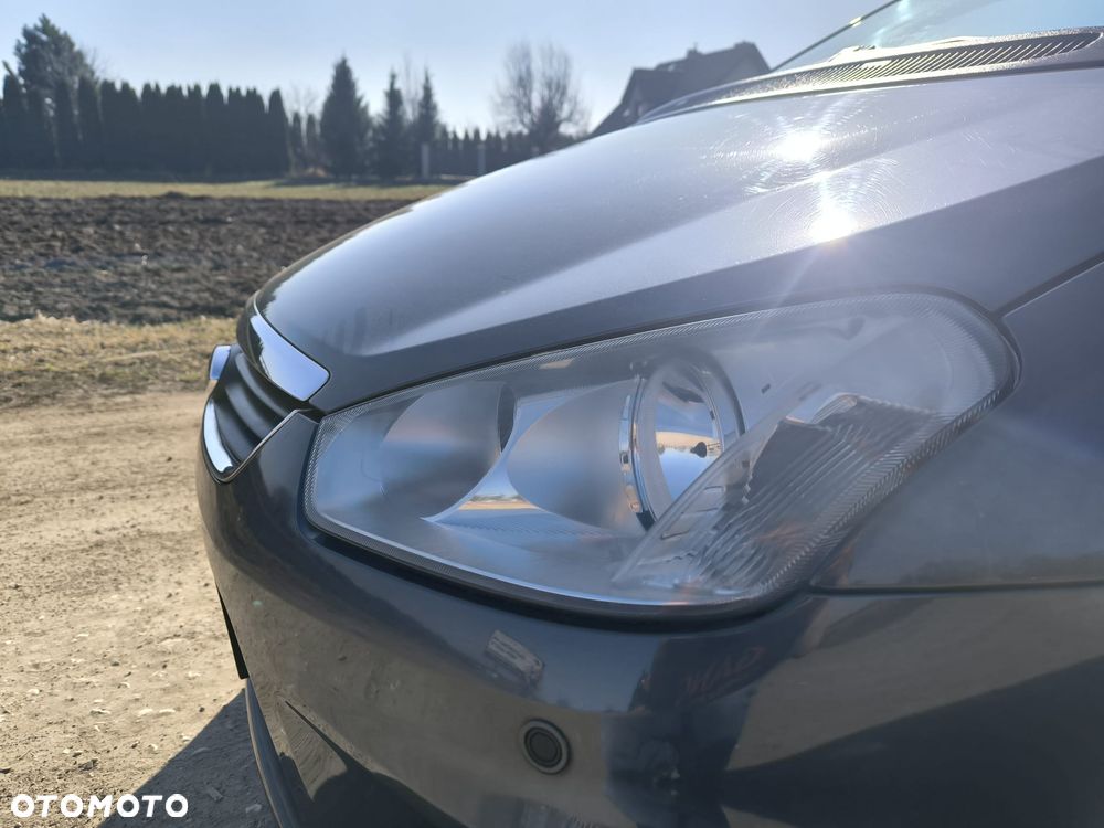 Ford C-MAX 1.8 TDCi Ghia - 11