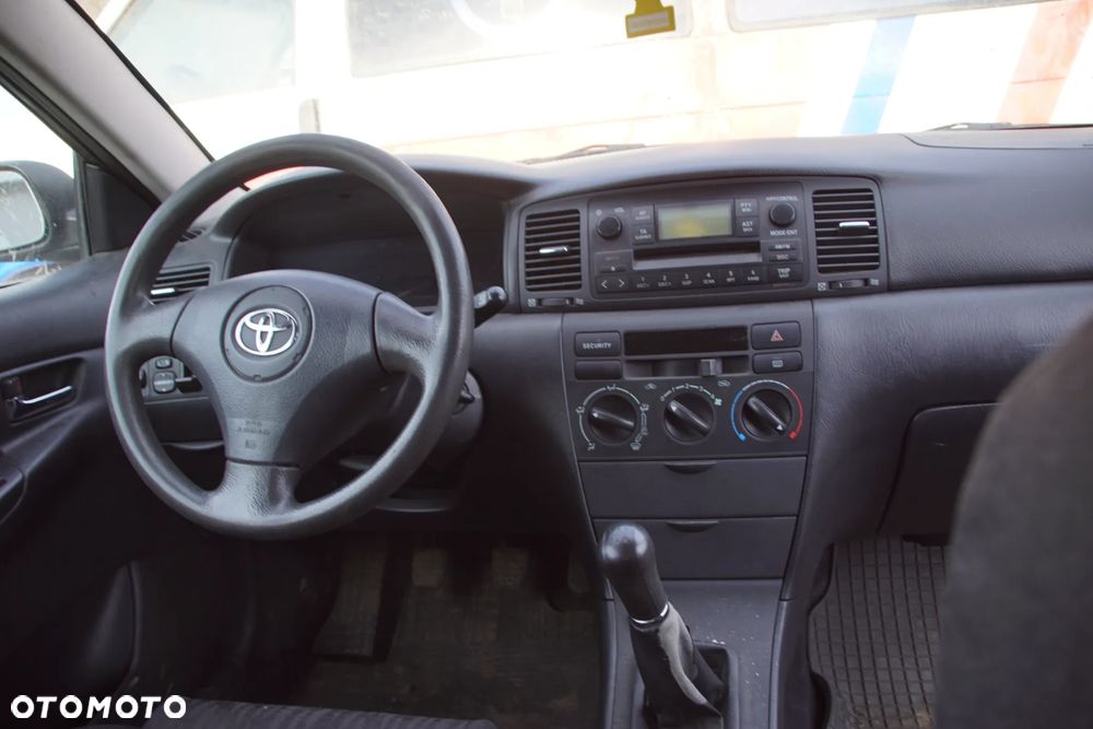 Auto na części - Toyota Corolla E12 1.4 VVT-i 97 KM 4ZZ-FE MTM 1C3 2002R Silnik Skrzynia Drzwi Maska Klapa Zderzak Błotnik Szyba Klamka Lampa Lusterko Deska Kokpit Sterownik Moduł Czujnik Licznik Panel Kierownica - 14