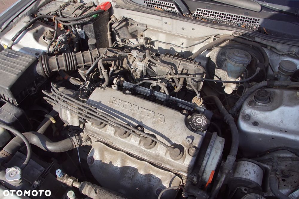 Auto na części - Honda Civic VI 1.4 16V 90 KM D14Z4 NH614M 1999R Silnik Skrzynia Drzwi Maska Klapa Zderzak Błotnik Lampa Szyba Lusterko Deska Kokpit Sterownik Moduł Czujnik Licznik Kierownica Panel - 17