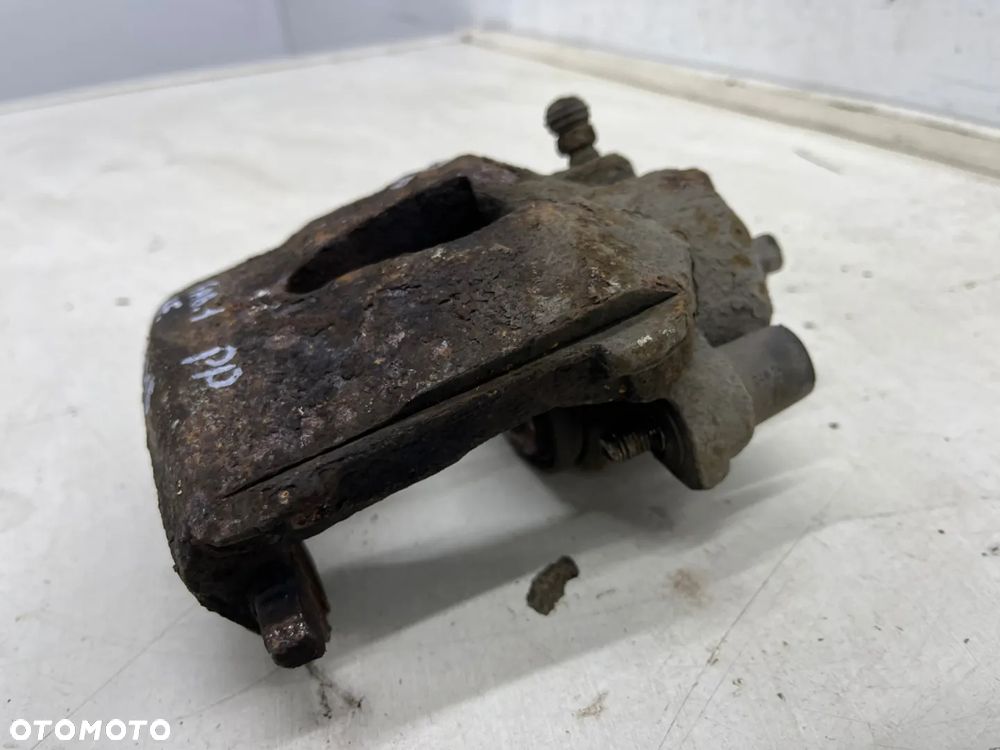 Zacisk hamulcowy VW Golf IV V VI Polo III IV Audi A3 8l 8p Leon I II Ibiza III IV Fabia I II III Octavia I II Caddy III 97-12r. prawy przedni jarzmo - 26