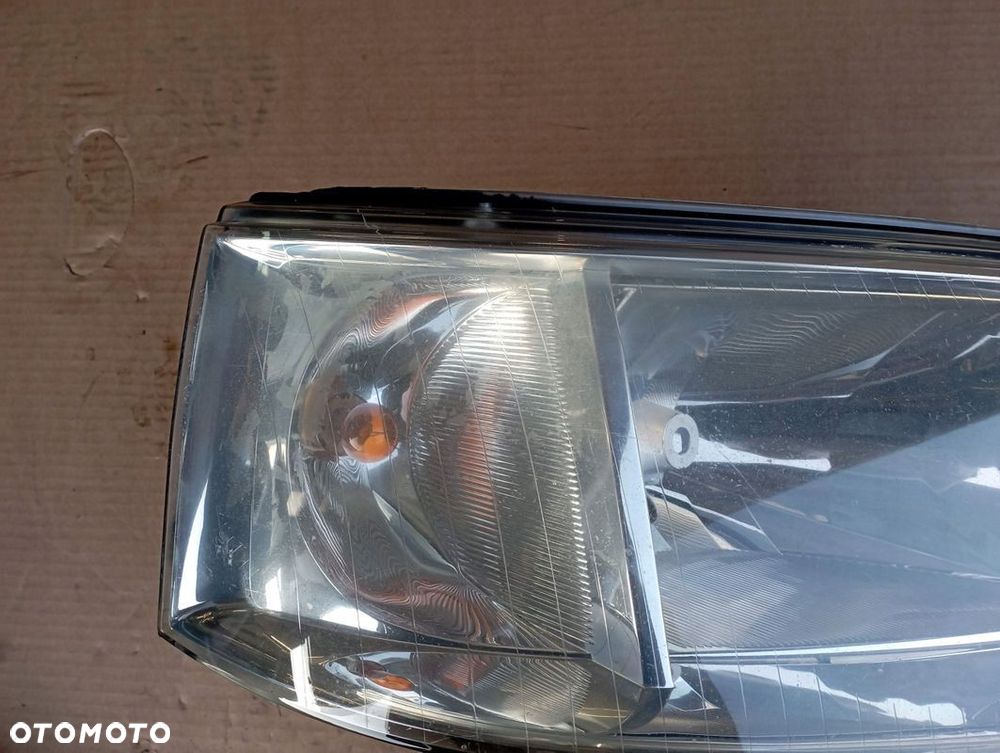 VW T5 LAMPA PRAWA PRZÓD PRZEDNIA EUROPA 7H1941016J - 2