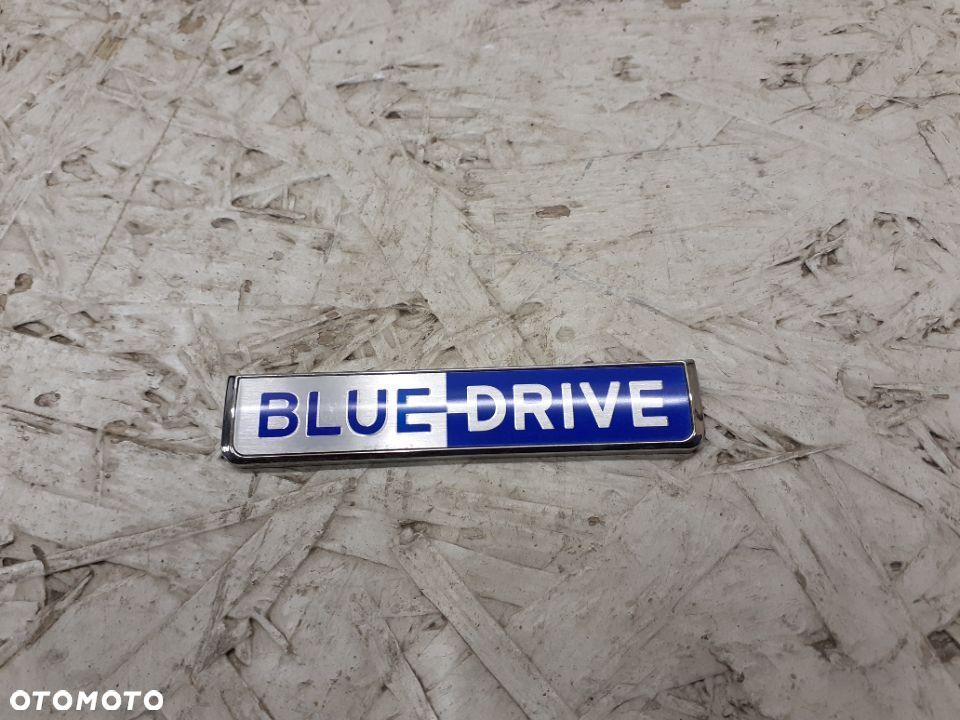 ZNACZEK EMBLEMAT NA BŁOTNIK PRAWY HYUNDAI KONA BLUEDRVIE BLUE DRIVE
