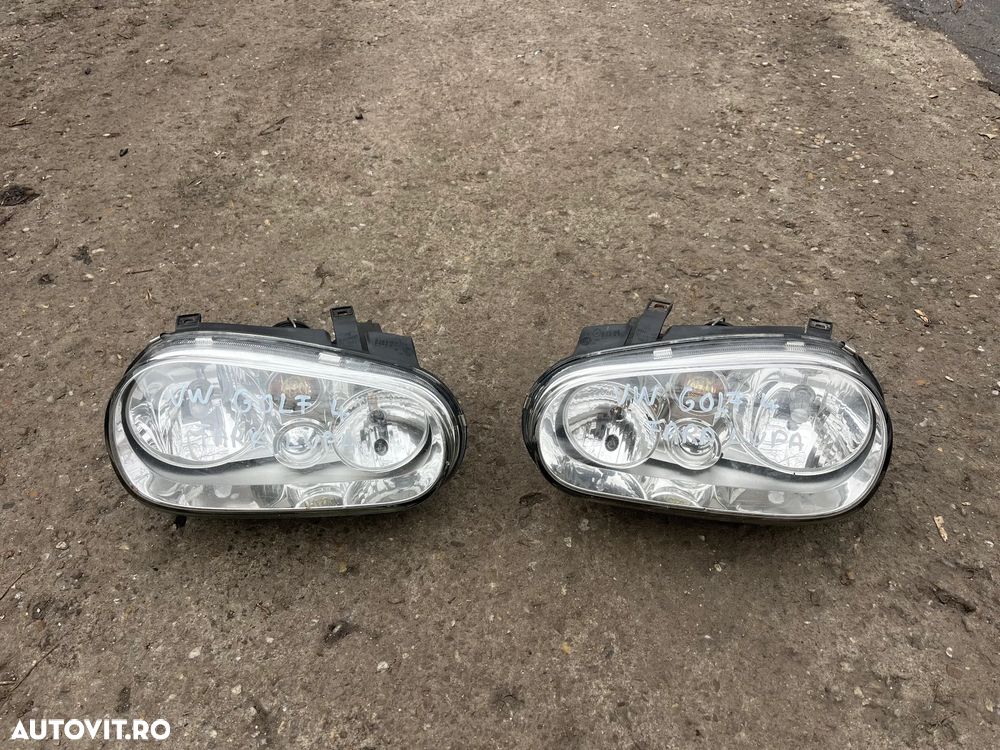 Set faruri Hella VW Volkswagen Golf 4 2002 impecabile - 1