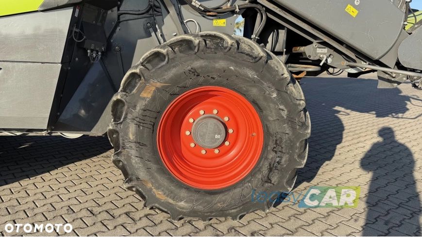 Claas Lexion 770 Terra Trac wyposażony w Header Vario 1230 12,27m - 11