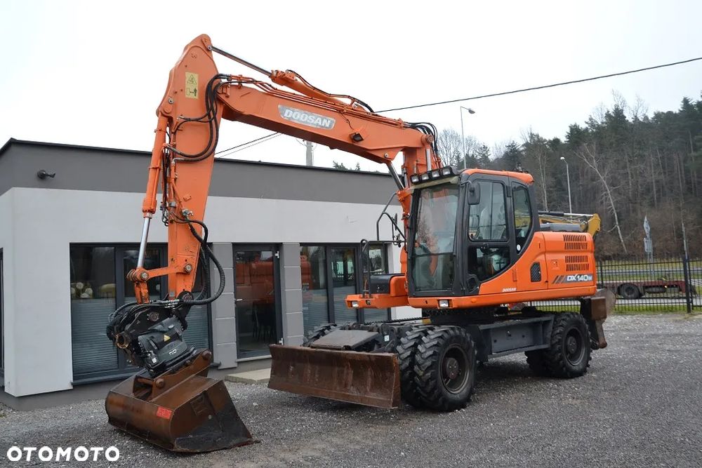 Doosan DX 140 W - 1