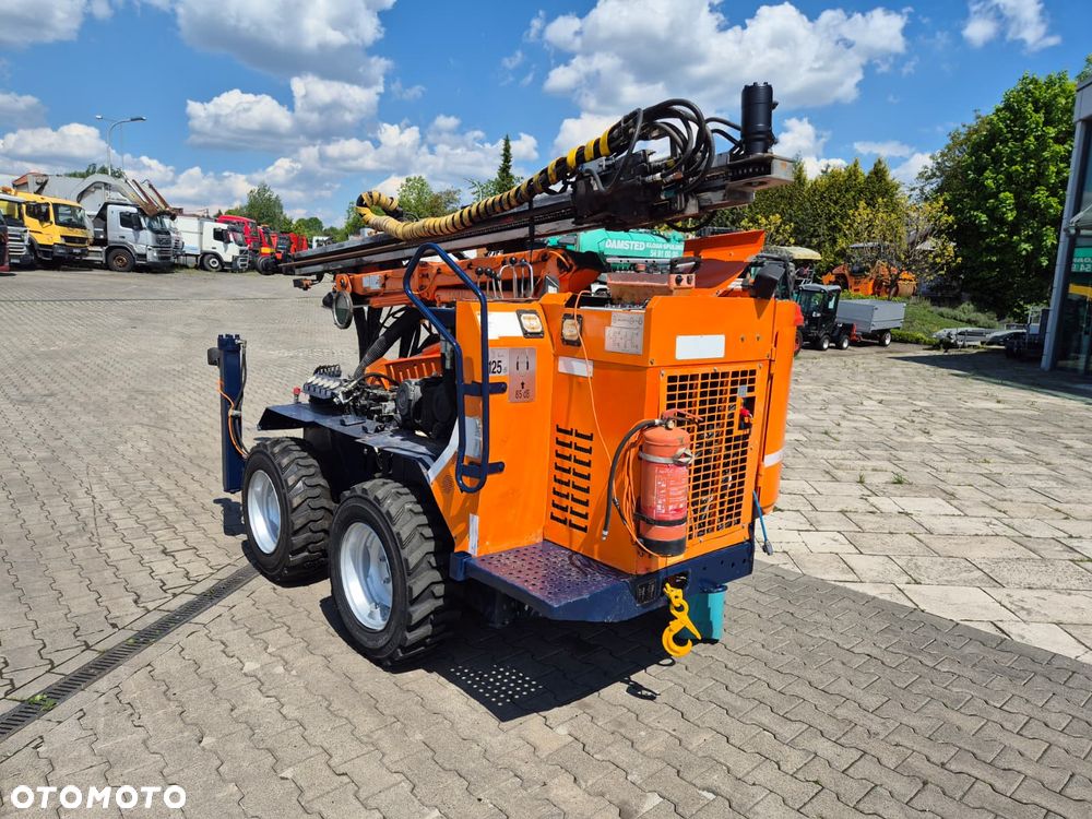 Sandvik Tamrock COMMANDO 120R 4X4 / WIERTNICA DO SKAŁ / SERWISOWANA / 1 WŁ / PEŁNA DOKUMENTACJA / WIELE CZĘŚCI ZAMIENNYCH / ZDALNE STEROWANIE / SILNIK CAT / TRANSPORT / NOWE OPONY - 9