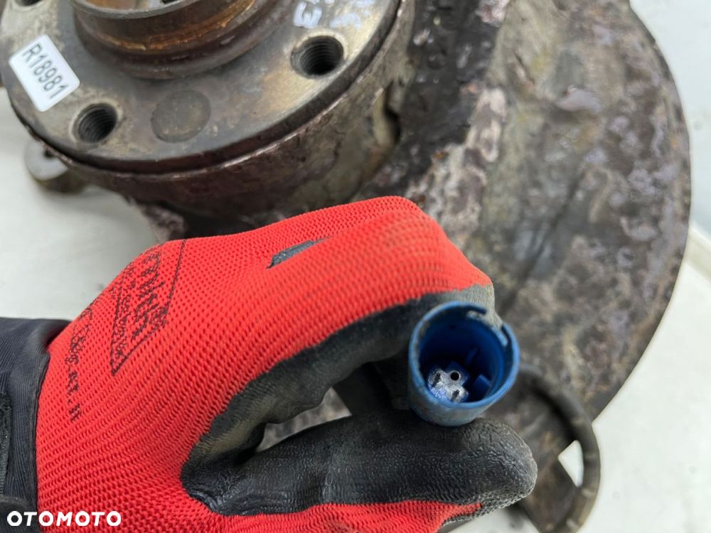 Zwrotnica BMW X5 E53 99-06r. 3.0d 3.0i 4.4i 4.8i piasta lewa przednia czujnik ABS lewy przód - 4