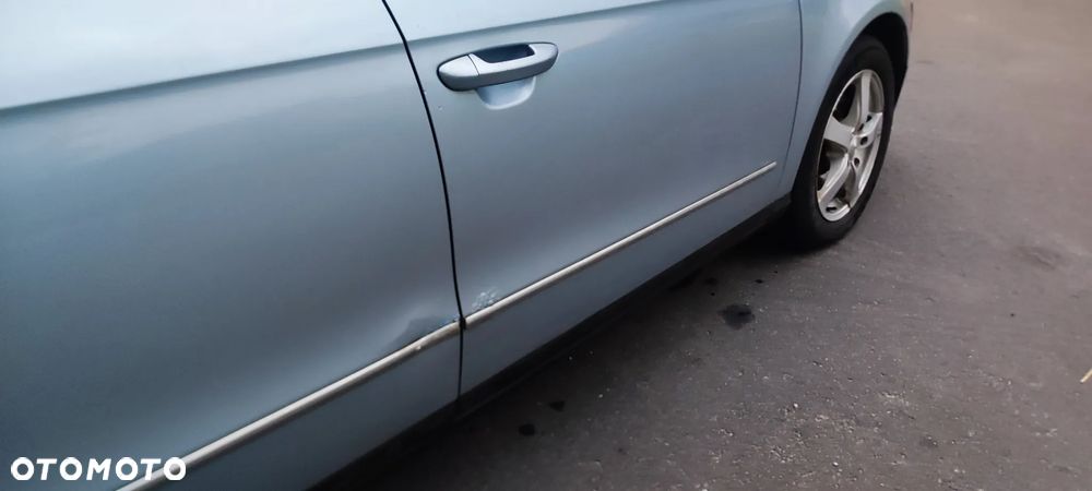 Volkswagen Passat 1.9 TDI Highline - 12