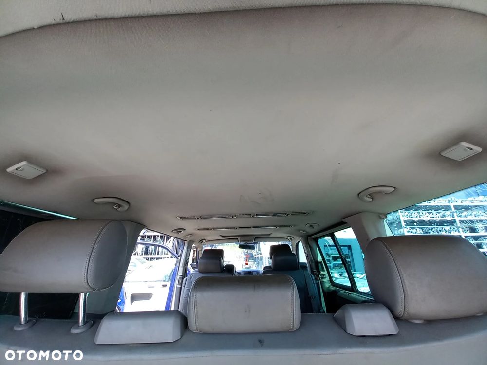 VW TRANSPORTER T5 MULTIVAN KOMPLETNA PRZEKŁADKA FOTELI DYWANÓW PODSUFITKI BOCZKI SŁUPKI NA MULTIVAN KOMPLET Z STOLIKIEM I ROLETĄ SKÓRA ALCANTARA - 14
