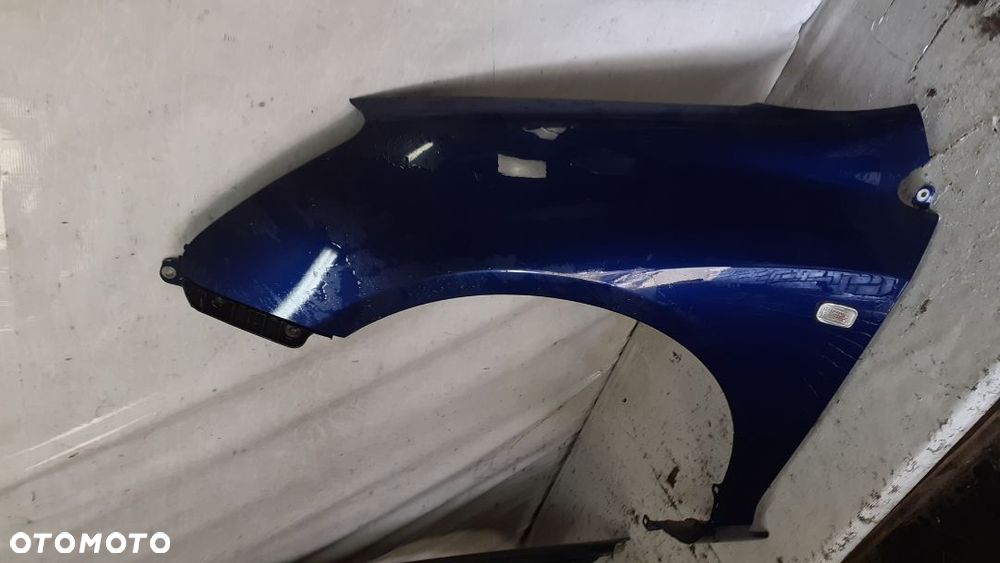 *HONDA CIVIC 7 VII BŁOTNIK PRZÓD LEWY GRANATOWY B96P - 2