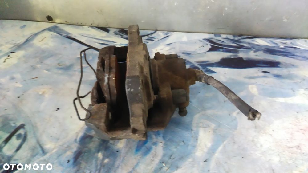 Zacisk hamulcowy PRZOD GOLF PLUS - 2