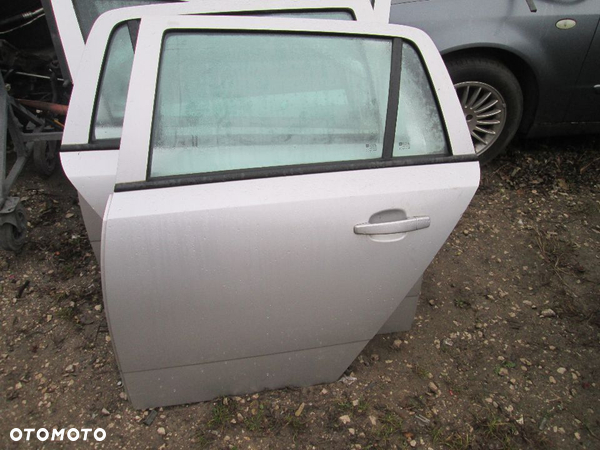 Drzwi lewy tył tylne Opel Astra H kombi Z157