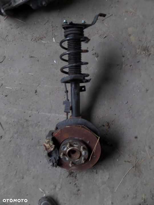 9553 Mcpherson lewy Mazda 3 09-13 - 1
