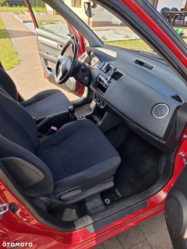 Suzuki Swift 1.3 Club - 11