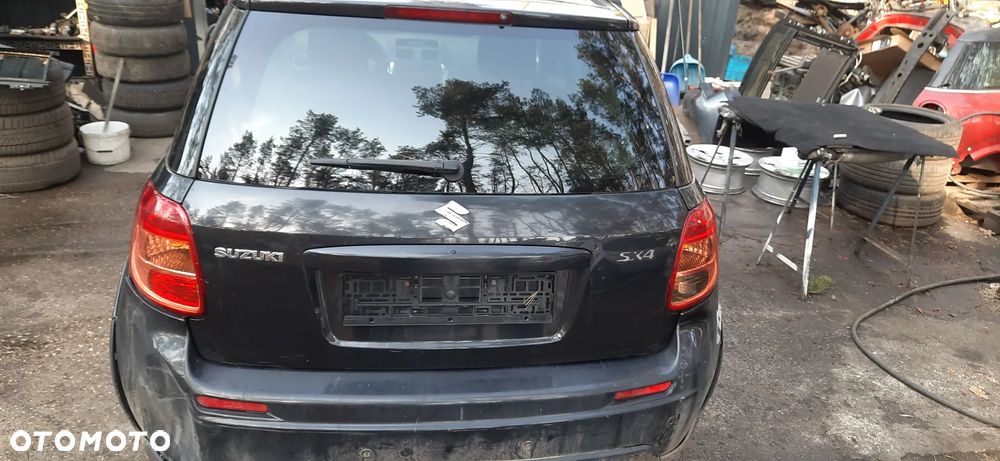 SUZUKI SX 4 SX4 FIAT SEDICI 1.9 DDIS Części Blacharskie i mechaniczne Szyba przód , Skrzynia biegów 79JA Napęd na przód Turbosprężarka 55205475 - 8
