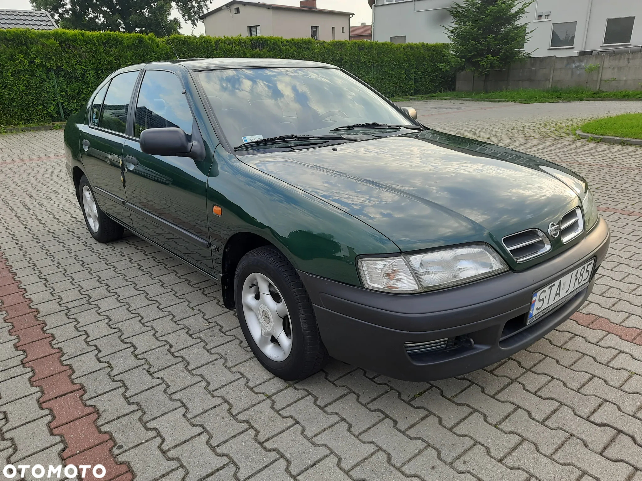 Nissan Primera 1.6 SLX (deu) - 7