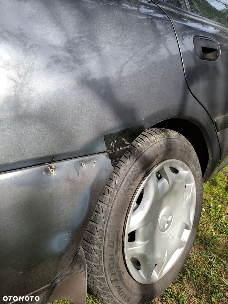 Mitsubishi Carisma 1.9 DID MP Comfort - 12