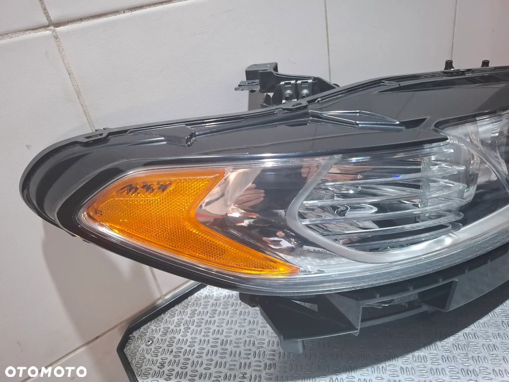 Lampa prawy przód Ford Fusion USA, Mondeo Mk5 R 2013 nr DS7313W029CD zwykła - do założenia - 2