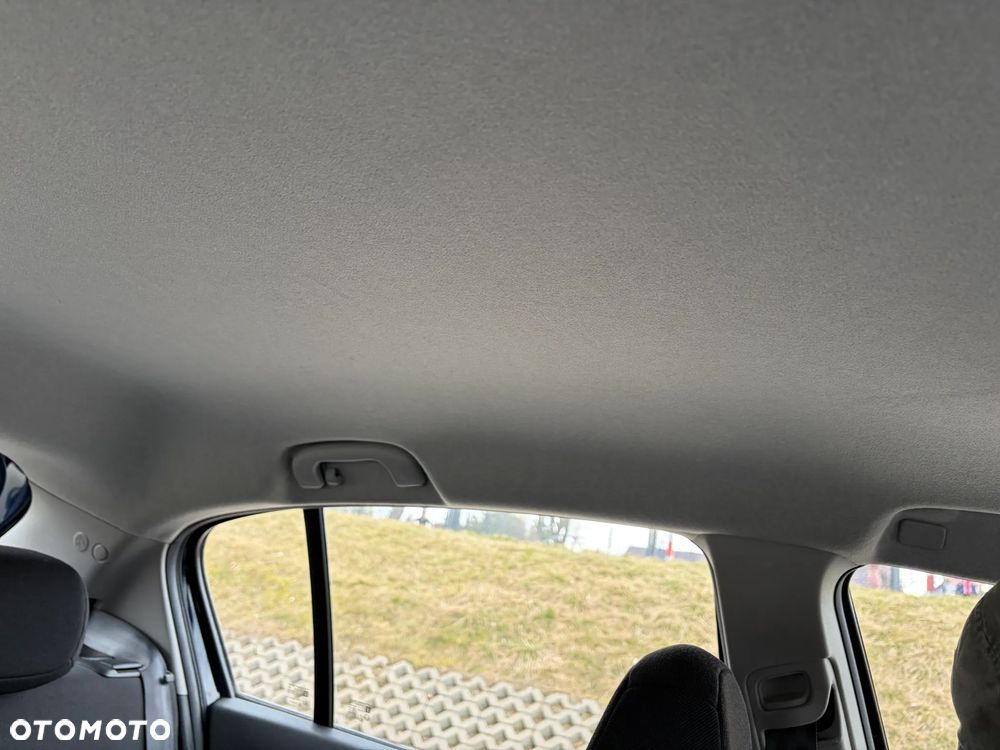 Opel Corsa 1.2 16V Enjoy - 23