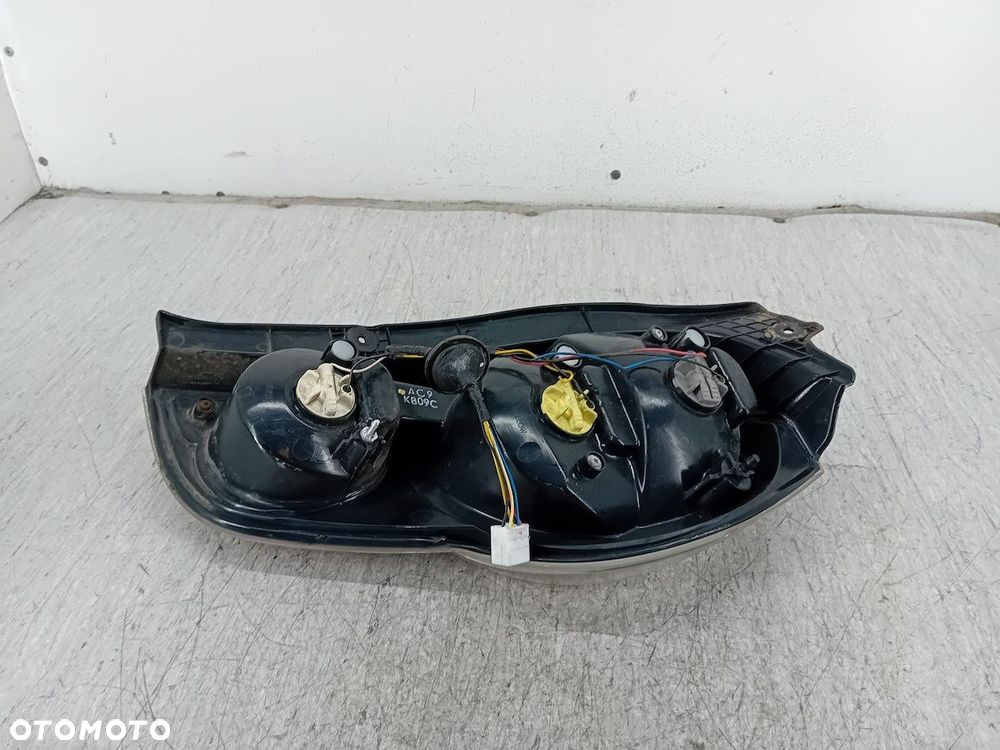 LAMPA TYLNA LEWA CHEVROLET SPARK II HATCHBACK - 2