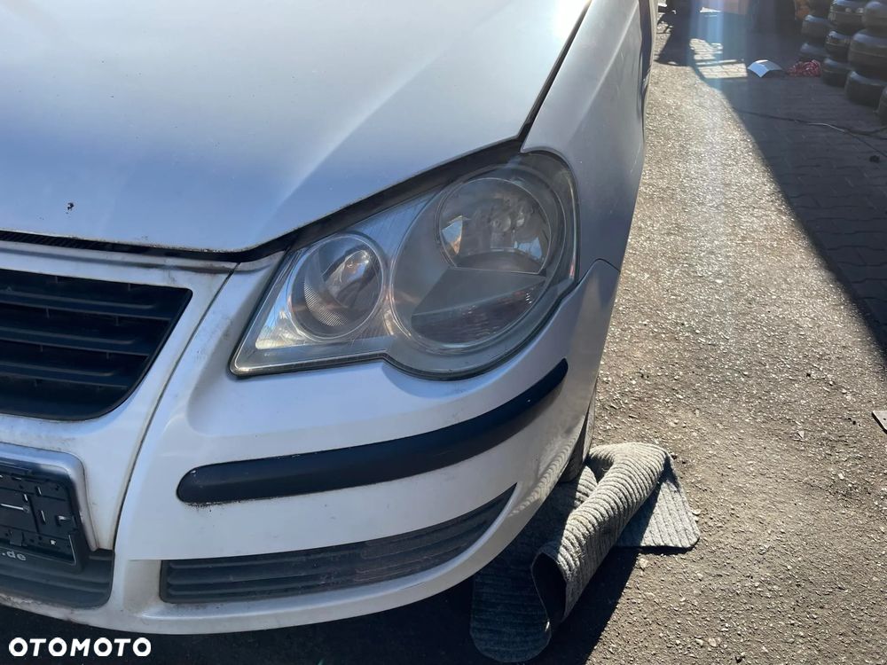 Lampa przednia lewa VW Polo 9N lift 05-09r.  EU - 1