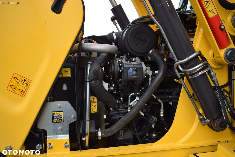 New Holland B110C - 40