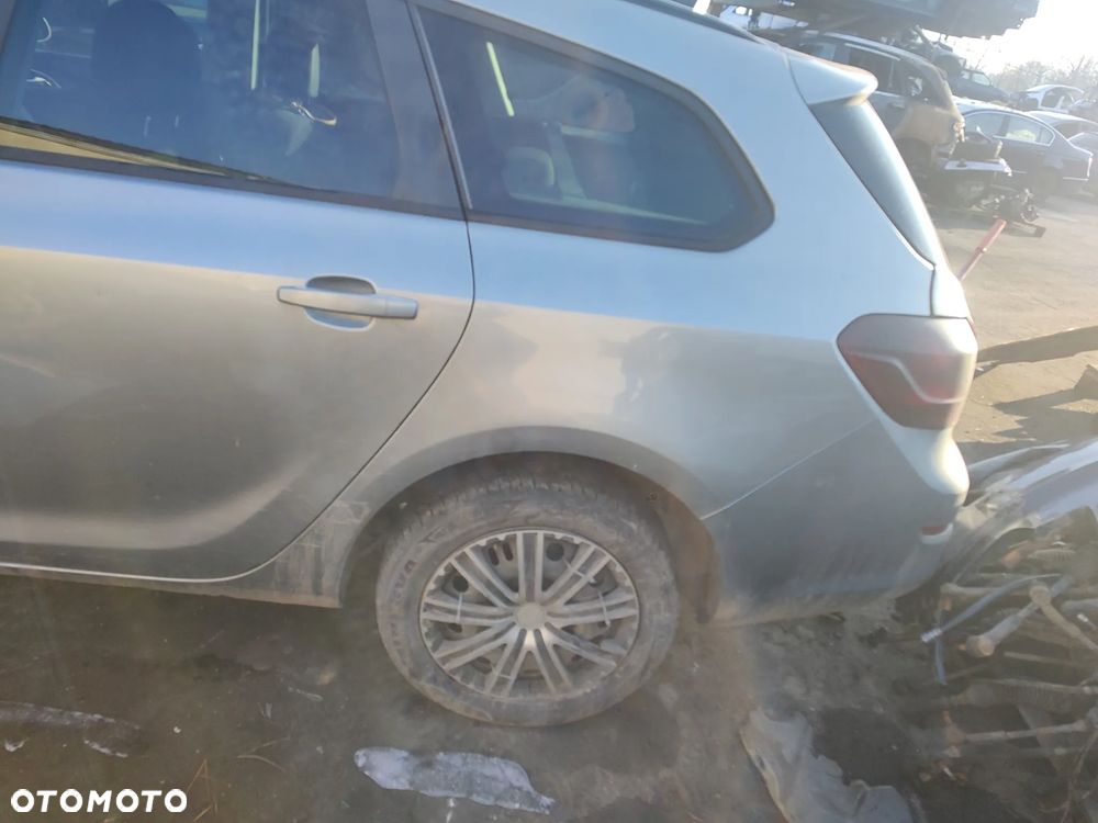 OPEL ASTRA J KOMBI PAS TYŁ WANNA Z179 - 1