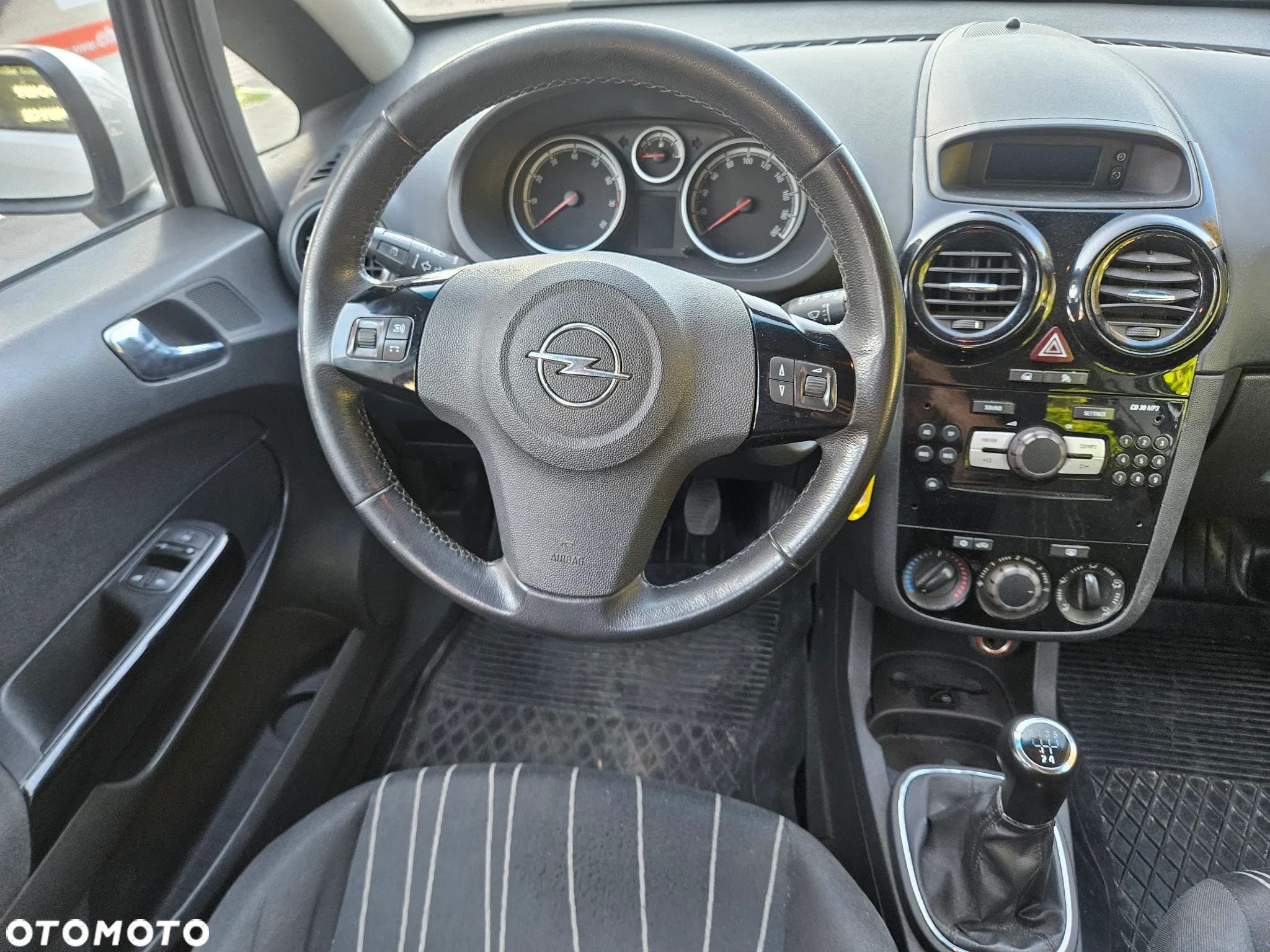 Opel Corsa 1.2 16V Enjoy - 9