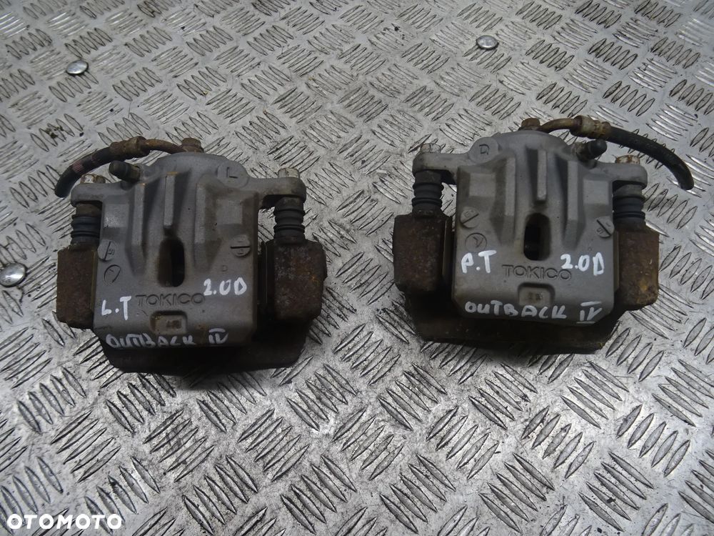 SUBARU OUTBACK IV 09-14 2.0D ZACISK HAMULCOWY PRAWY LEWY TYŁ TYLNY - 1